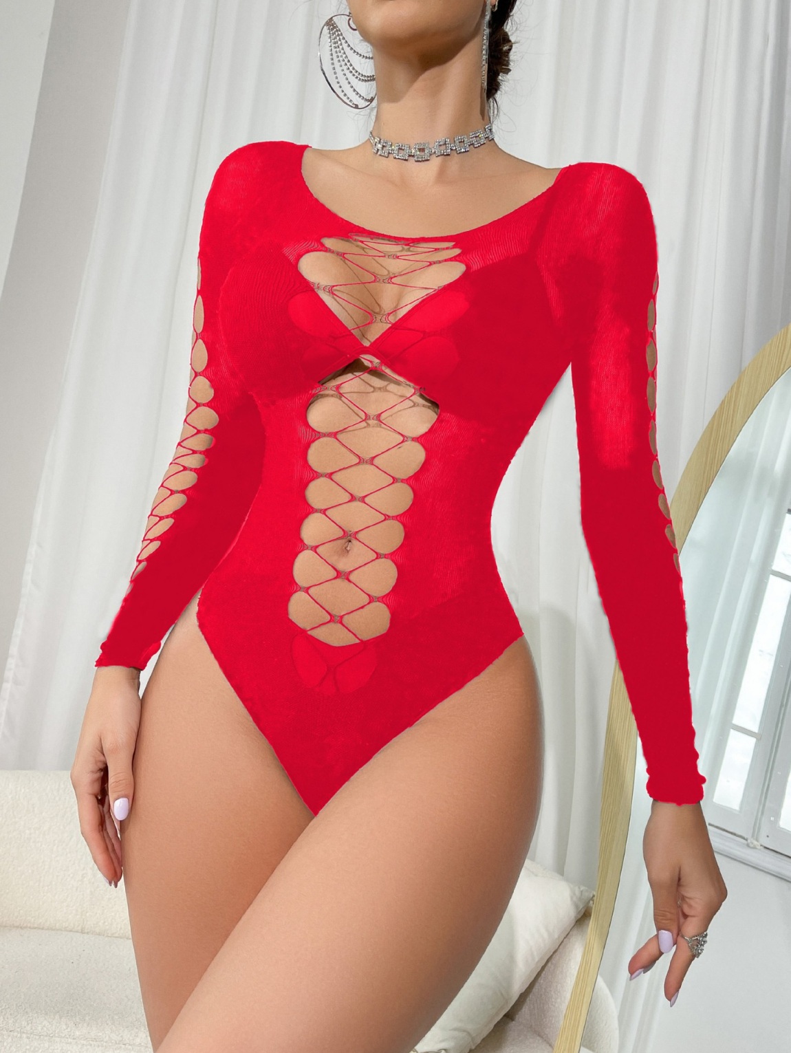 Long sleeve sheer net bodysuit.